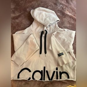 Cropped pink Calvin Klein hoodie. Barely worn. Size sm/med.